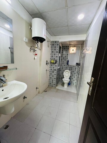 Bathroom in 3 BHK Apartment at Aims Golf Avenue II, Sector 75 – for Rent