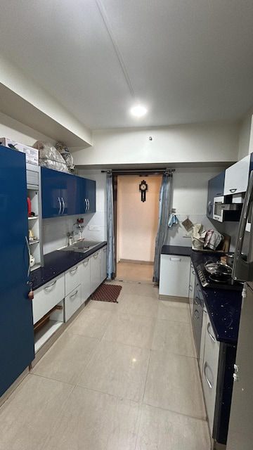 Kitchen in 3 BHK Apartment at Prateek Wisteria, Sector 77 – for Rent