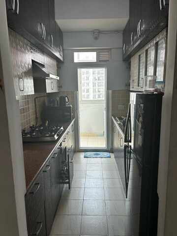 Kitchen in 4 BHK Apartment at Mahagun Mezzaria, Sector 78 – for Rent