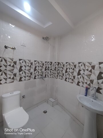 Bathroom in 3 BHK Builder Floor at Dwarka Mor – for Rent