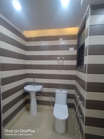Bathroom in 3 BHK Builder Floor at Dwarka Mor – for Rent