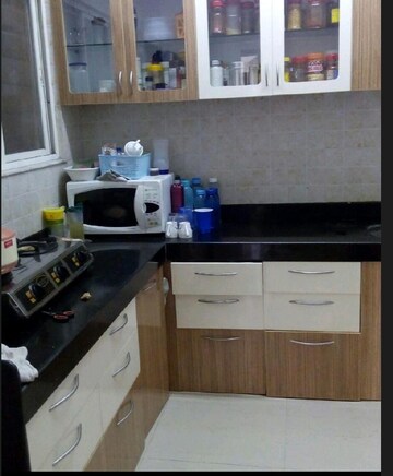 Kitchen in 3 BHK Apartment at Vasupujya Neco SkyPark, Pimple Nilakh – for Rent