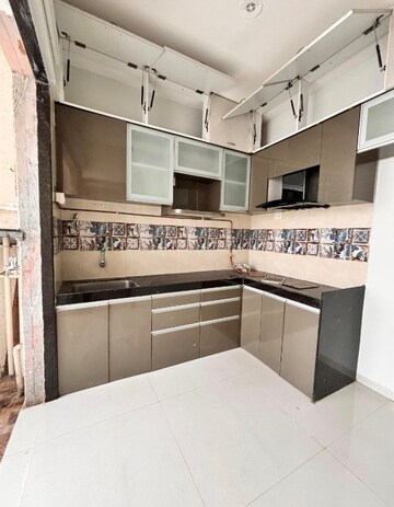 Kitchen in 2 BHK Apartment at Sai Proviso Leisure Town, Hadapsar – for Rent