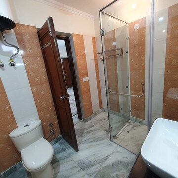 Bathroom in 4 BHK Builder Floor at Sarvodaya Enclave – for Rent