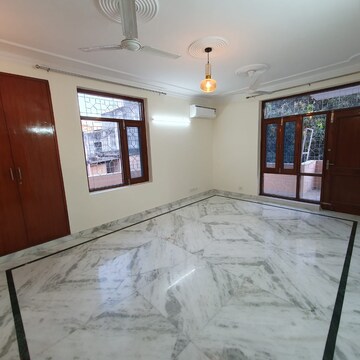 Bedroom in 4 BHK Builder Floor at Sarvodaya Enclave – for Rent