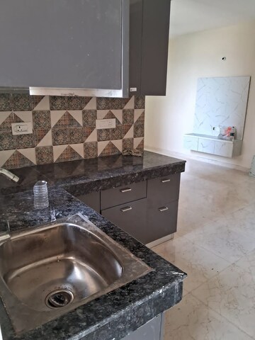 Kitchen in 2 BHK Apartment at MRG The Balcony, Sector 93 – for Rent