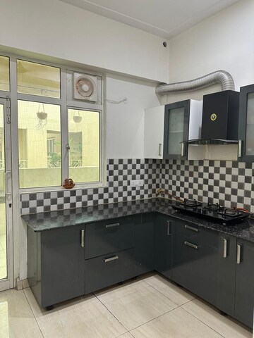 Kitchen in 3.5 BHK Apartment at Gaur Saundaryam, Tech Zone 4 Greater Noida – for Rent