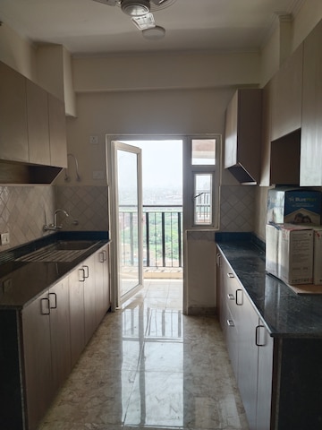 Kitchen in 3 BHK Apartment at Amrapali Terrace Homes, Tech Zone 4 Greater Noida – for Rent
