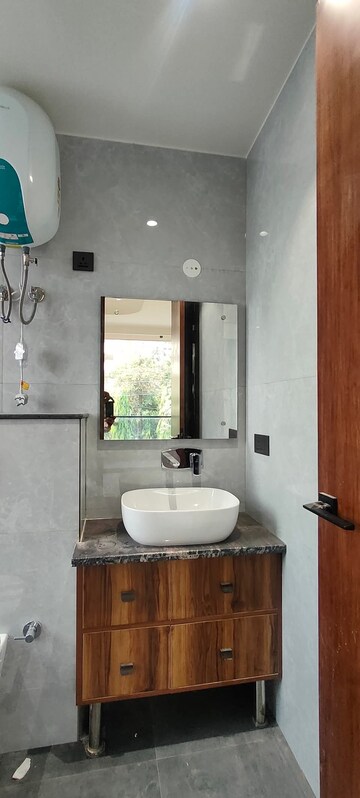 Bathroom in 4 BHK Apartment at Green Wood City, Sector 45 – for Sale