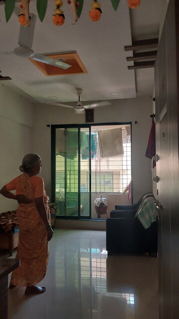 Living Room in 1 BHK Apartment at Kopar Khairane Sector 19 – for Sale