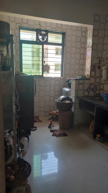 Kitchen in 1 BHK Apartment at Kopar Khairane Sector 19 – for Sale