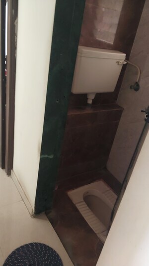 Bathroom in 1 BHK Apartment at Kopar Khairane Sector 19 – for Sale