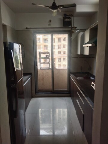 Kitchen in 2 BHK Apartment at Ghodbunder Road – for Rent