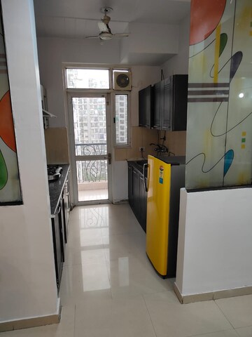 Kitchen in 2 BHK Apartment at Prateek Wisteria, Sector 77 – for Rent