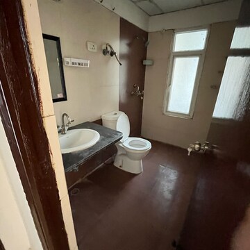Bathroom in 2.5 BHK Apartment at Mahagun Moderne, Sector 78 – for Rent