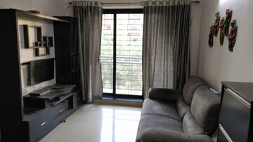 Living Room in 1 BHK Apartment at K Raheja Heights, Malad East – for Rent
