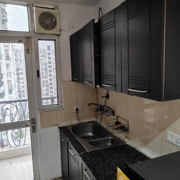 Kitchen in 2.5 BHK Apartment at Prateek Wisteria, Sector 77 – for Rent