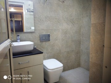 Bathroom in 3 BHK Builder Floor at Ansal Sushant Residency, Sushant Lok Iii – for Sale