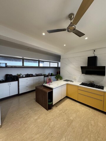 Kitchen in 4 BHK Apartment at Model Colony – for Sale