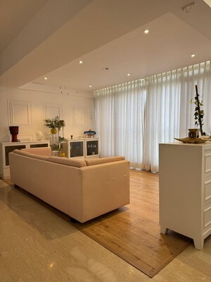 Living Room in 4 BHK Apartment at Model Colony – for Sale