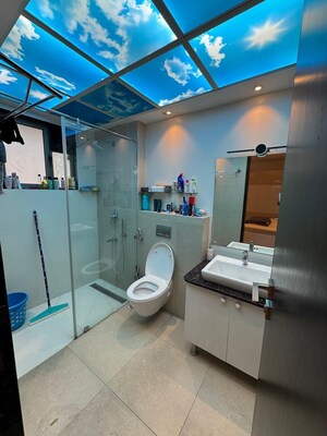 Bathroom in 4 BHK Apartment at Model Colony – for Sale