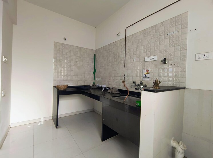 Kitchen, nyati-elan 2 Bedroom 694 Sq.Ft. Apartment In Wagholi Pune 8763852