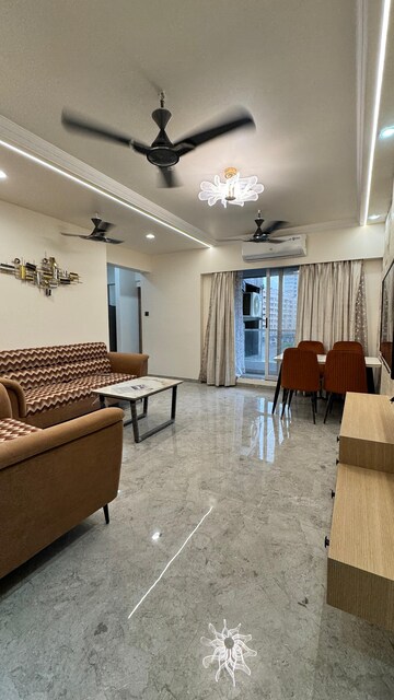Living Room in 1 BHK Apartment at Om Ved Heights, Shirgaon – for Sale