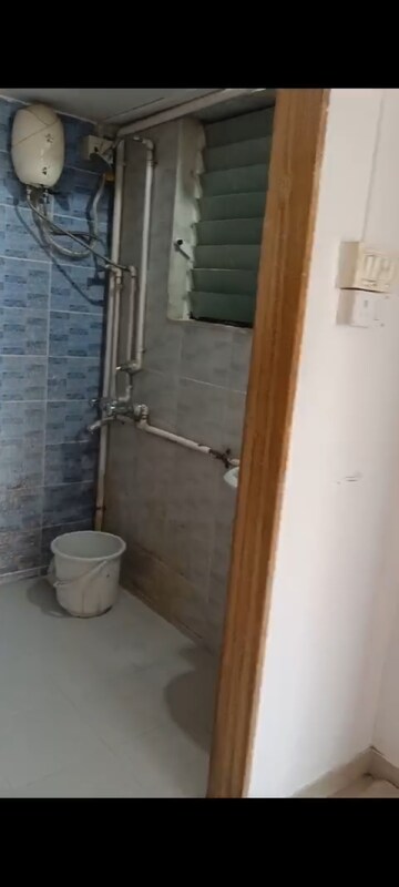Bathroom in 1 BHK Apartment at Omkar Vayu, Mahim – for Rent