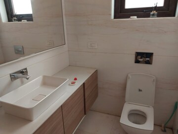 Bathroom in 3 BHK Builder Floor at Shri Radha Sky Gardens, Sector 16b Greater Noida – for Rent