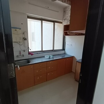 Kitchen in 2.5 BHK Apartment at Siddhivinayak Horizon, Hatiskar Wadi – for Rent