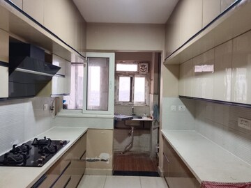Kitchen in 3 BHK Apartment at Pashmina Waterfront, Old Madras Road – for Rent