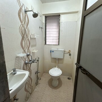 Bathroom in 2 BHK Apartment at Cosmos Empress Park, Kasarvadavali – for Rent