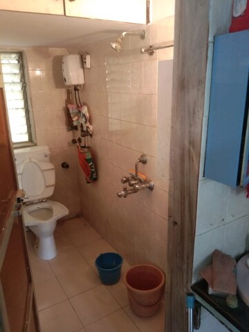Bathroom in 2 BHK Apartment at Paranjape Schemes Snehdeep, Goregaon East – for Rent
