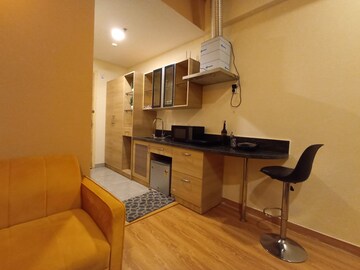 Living Room in Studio Apartment at Gaur City Center, Sector 4 Greater Noida – for Rent