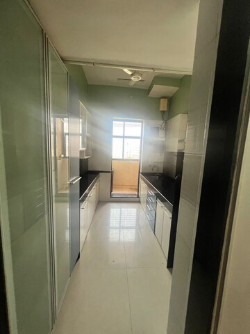 Kitchen in 3 BHK Apartment at K Raheja Heights, Malad East – for Rent