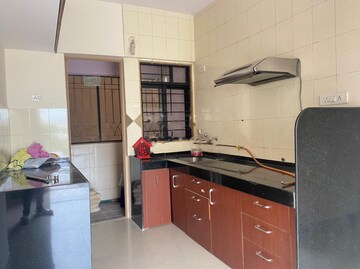 Kitchen in 2 BHK Apartment at Sancheti Eves Garden, Mundhwa – for Rent