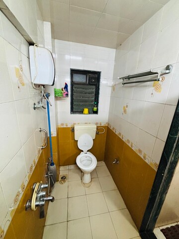 Attached Bathroom in 2 BHK Apartment at Harikripa CHS Andheri, Andheri East – for Sale