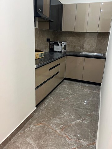 Kitchen in 3 BHK Builder Floor at Ansal Sushant Floors, Sushant Lok ii – for Rent