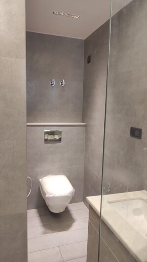 Bathroom in 4 BHK Apartment at Mahavir Enclave 1 – for Sale