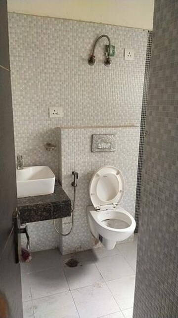 Bathroom in 3 BHK Builder Floor at Chahak Plaza, Shakti Khand – for Rent