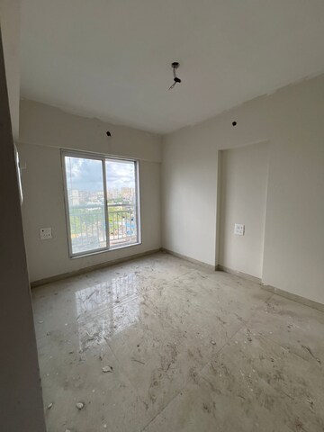 Room in 1 BHK Apartment at Chandiwala Pearl Regency, Andheri West – for Sale