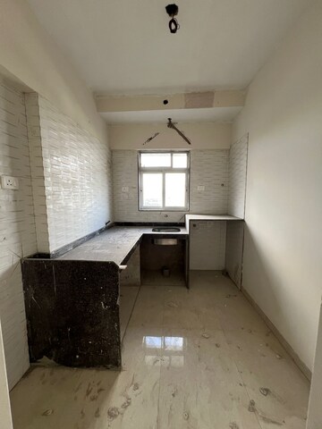 Kitchen in 1 BHK Apartment at Chandiwala Pearl Regency, Andheri West – for Sale