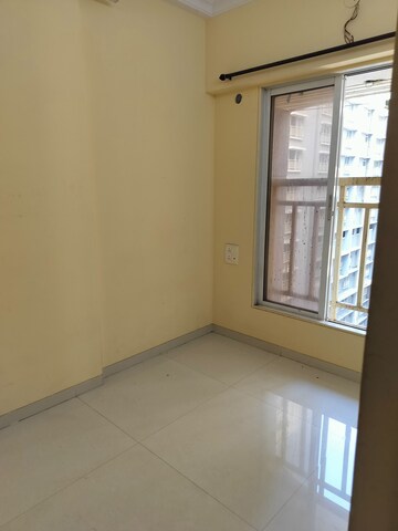 Room in 2 BHK Apartment at Chandiwala Pearl Harmony, Andheri West – for Rent