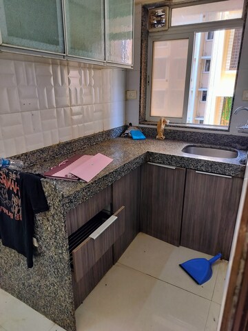 Kitchen in 2 BHK Apartment at Chandiwala Pearl Harmony, Andheri West – for Rent