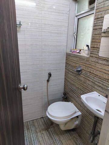 Bathroom in 2 BHK Apartment at Chandiwala Pearl Harmony, Andheri West – for Rent
