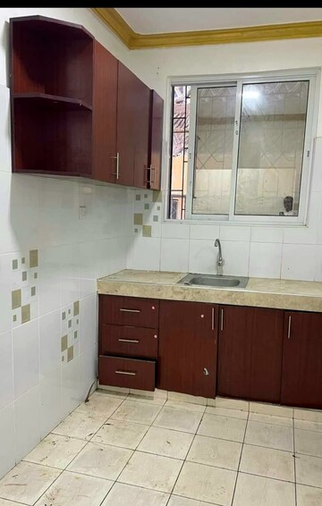 Kitchen in 3 BHK Apartment at Aarti CHS Mulund West, Mulund West – for Sale