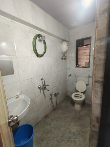 Bathroom in 1 BHK Apartment at Indu  Nivaan Annexe, Kharghar – for Rent