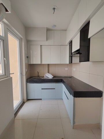 Kitchen in 3 BHK Apartment at Tata Eureka Park, Sector 150 – for Rent