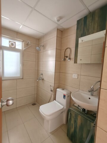Bathroom in 3 BHK Apartment at Tata Eureka Park, Sector 150 – for Rent