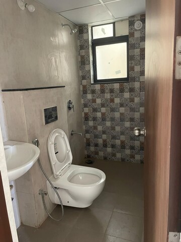 Bathroom in 4 BHK Apartment at Shapoorji Pallonji Vanaha Golfland, Bavdhan – for Rent